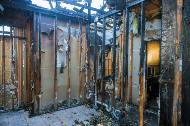 Professional Emergency Fire Damage Restoration technician working in Cambridge, WI